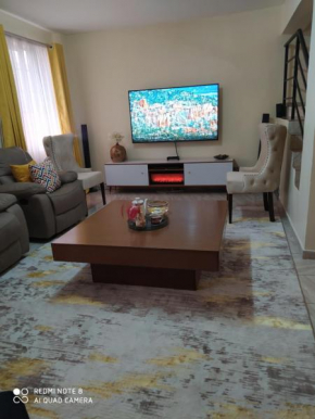ZOE HOMES Home Away From Home For Cozy And Modern Stay
